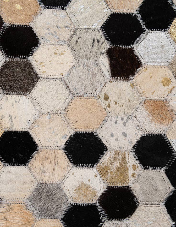 Detail image of  4' 11 x 7' 9 Cowhide - Patchwork Rug