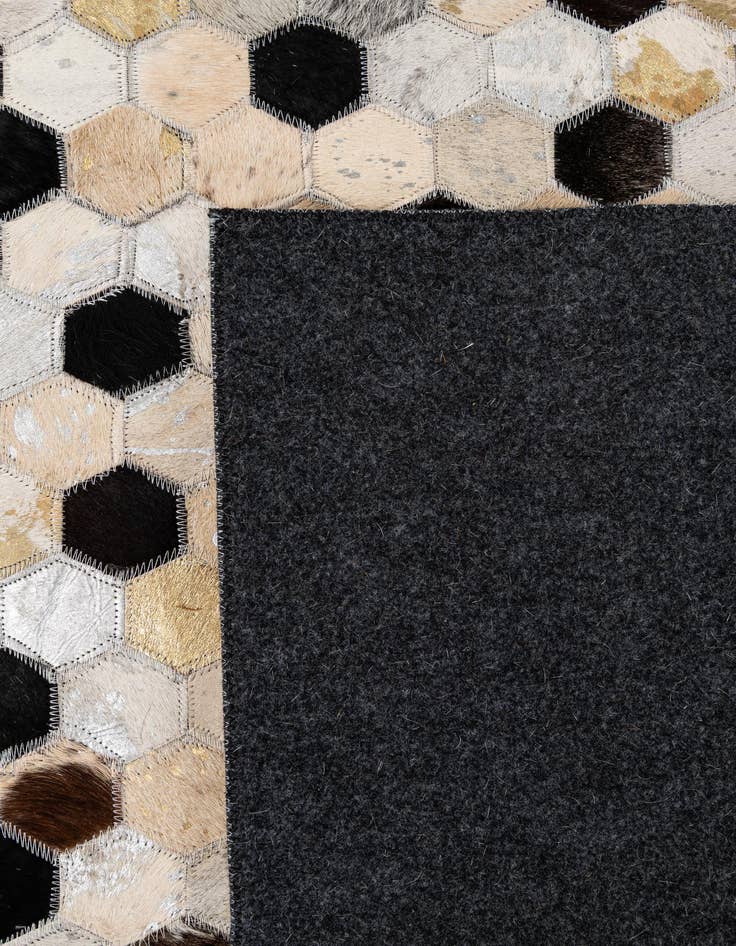 Detail image of  4' 11 x 7' 9 Cowhide - Patchwork Rug