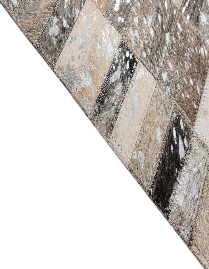 Detail image of  5' x 7' 11 Cowhide - Patchwork Rug