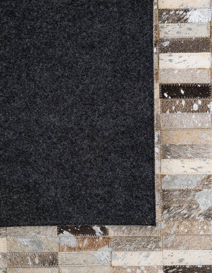 Detail image of  5' x 7' 11 Cowhide - Patchwork Rug