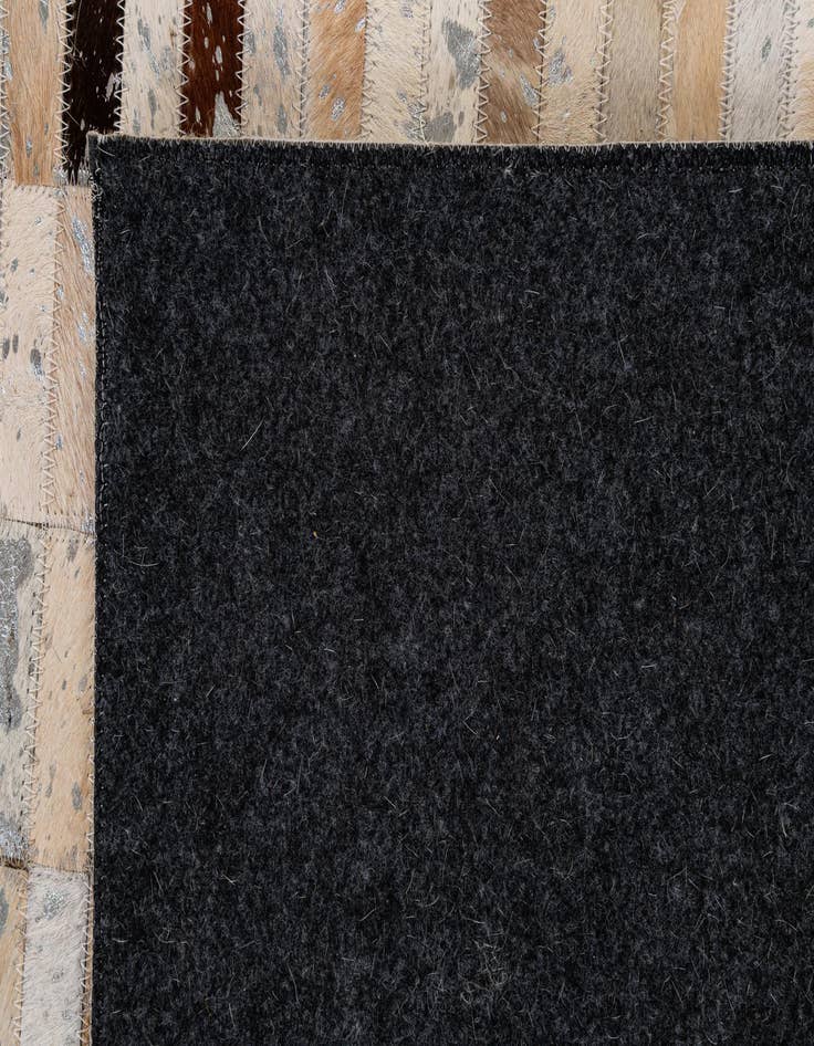 Detail image of  5' 2 x 7' 10 Cowhide - Patchwork Rug