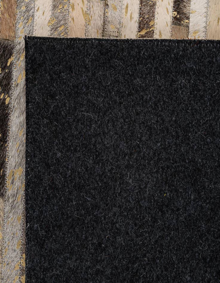 Detail image of  5' 1 x 8' 2 Cowhide - Patchwork Rug