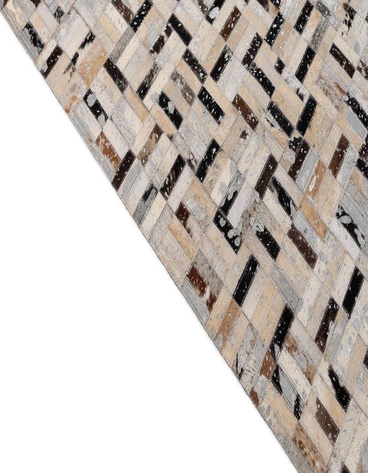 Detail image of  4' 11 x 7' 11 Cowhide - Patchwork Rug