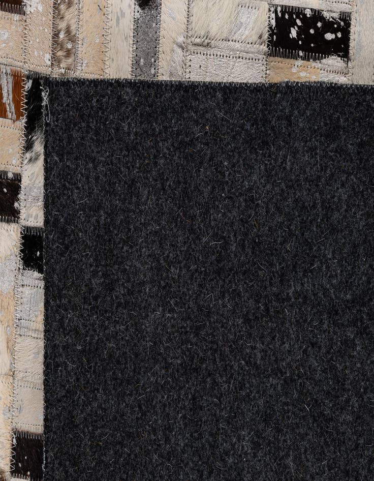 Detail image of  4' 11 x 7' 11 Cowhide - Patchwork Rug
