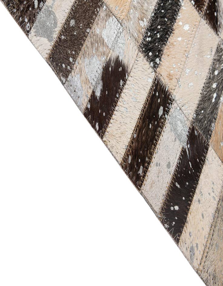 Detail image of  5' 2 x 8' Cowhide - Patchwork Rug