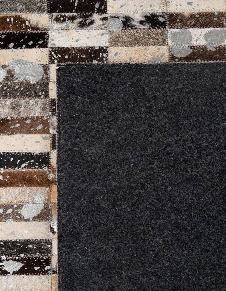 Detail image of  5' 2 x 8' Cowhide - Patchwork Rug