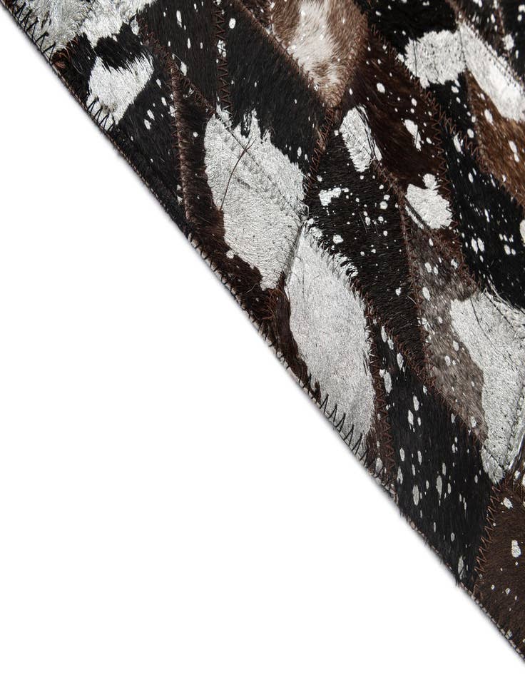 Detail image of  5' 1 x 7' 11 Cowhide - Patchwork Rug