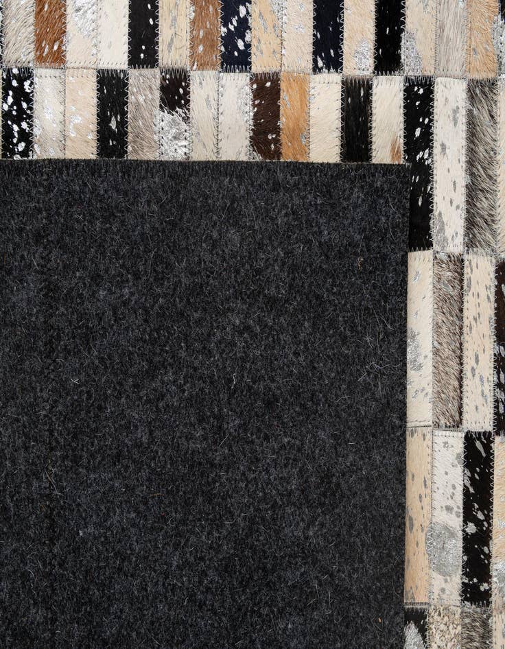 Detail image of  5' 1 x 8' 1 Cowhide - Patchwork Rug