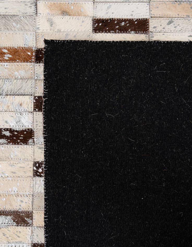 Detail image of  5' 1 x 8' Cowhide - Patchwork Rug