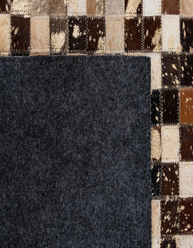 Detail image of  5' 1 x 7' 10 Cowhide - Patchwork Rug