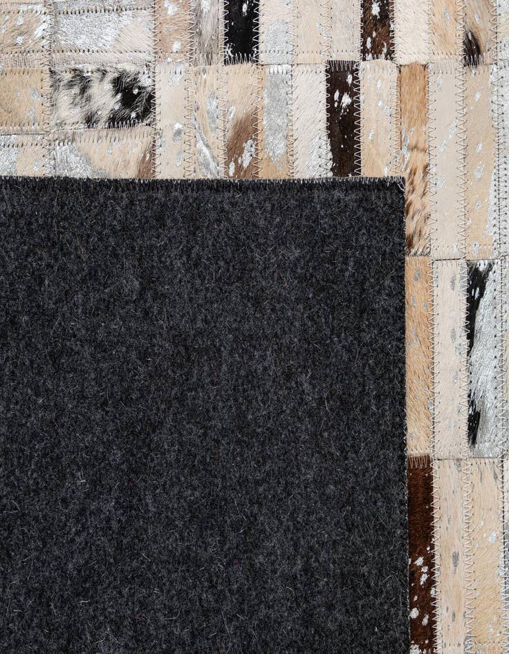 Detail image of  5' x 7' 11 Cowhide - Patchwork Rug