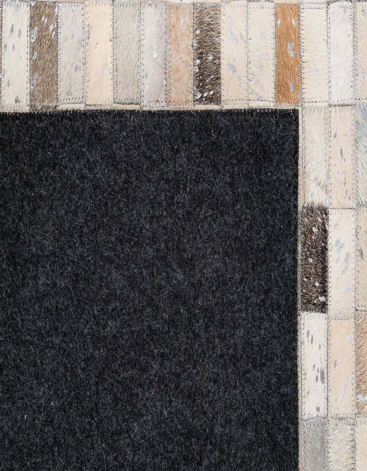 Detail image of  5' 2 x 7' 11 Cowhide - Patchwork Rug