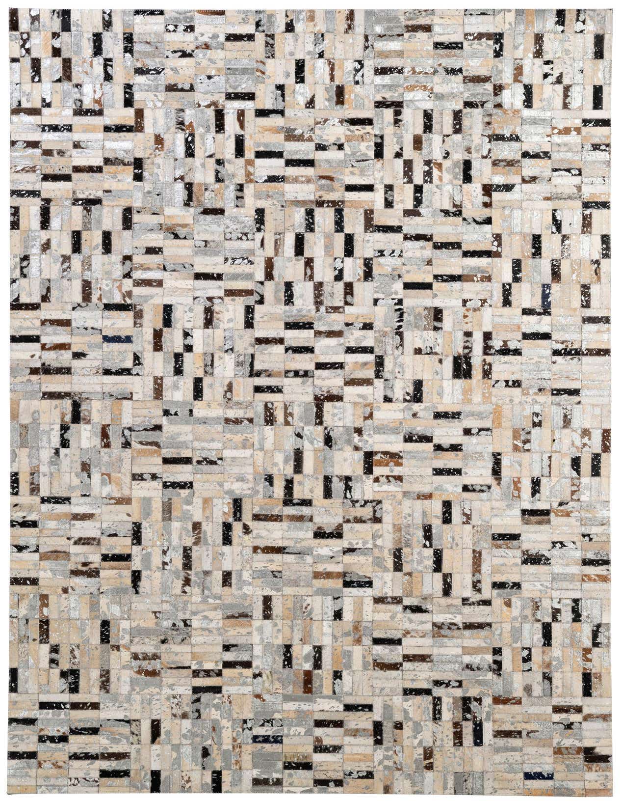 A 5x8 rectangular multi-colored patchwork cowhide rug, featuring various shades of white, beige, brown, and black, perfect for a modern living room.