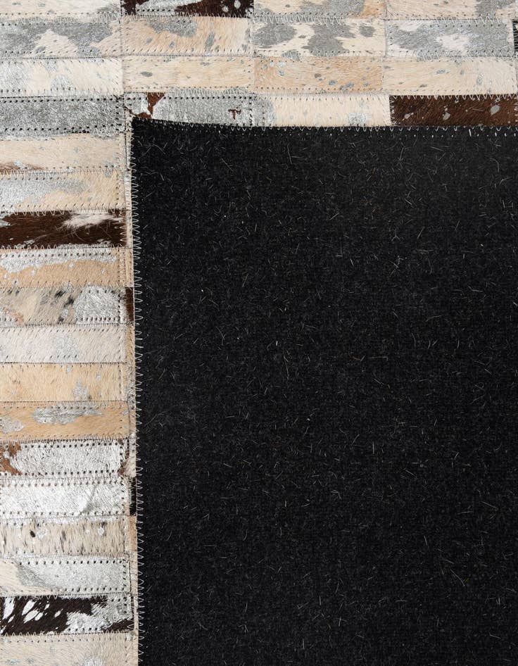 Detail image of  5' x 7' 11 Cowhide - Patchwork Rug