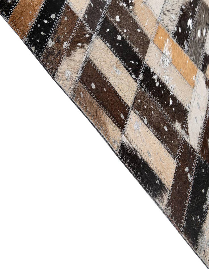 Detail image of  4' 11 x 7' 10 Cowhide - Patchwork Rug