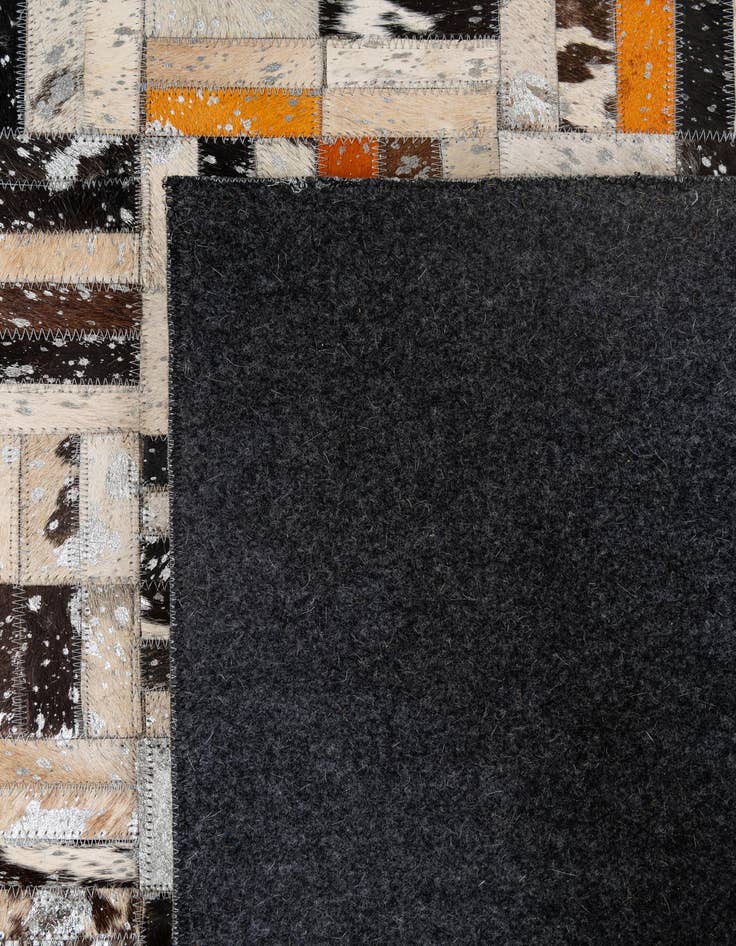 Detail image of  4' 11 x 7' 10 Cowhide - Patchwork Rug