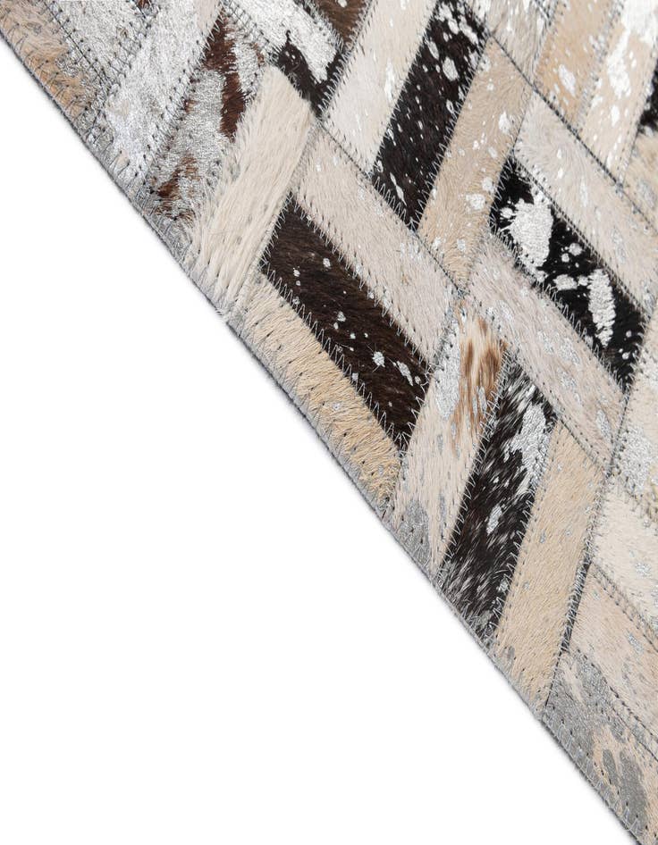 Detail image of  5' x 7' 11 Cowhide - Patchwork Rug