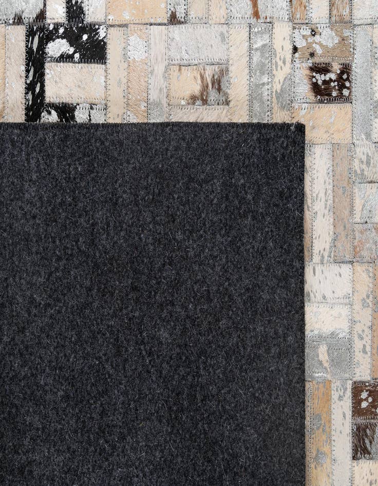 Detail image of  5' x 7' 11 Cowhide - Patchwork Rug