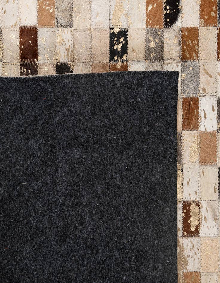 Detail image of  5' 1 x 8' 1 Cowhide - Patchwork Rug