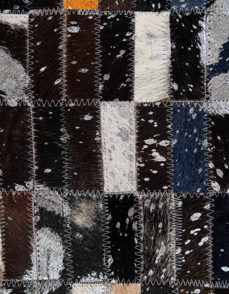 Detail image of  5' 2 x 8' Cowhide - Patchwork Rug