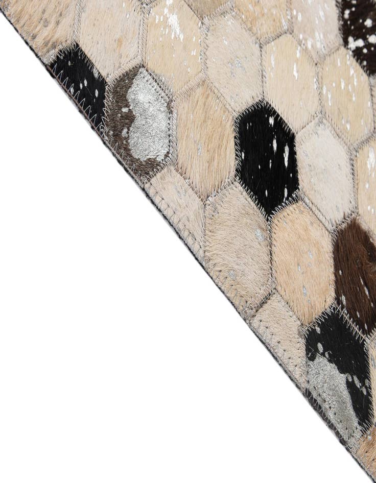 Detail image of  4' 11 x 7' 10 Cowhide - Patchwork Rug