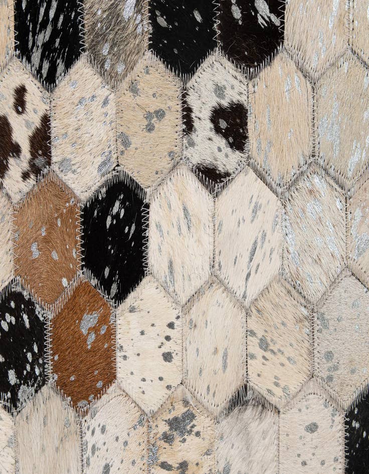 Detail image of  4' 11 x 7' 10 Cowhide - Patchwork Rug