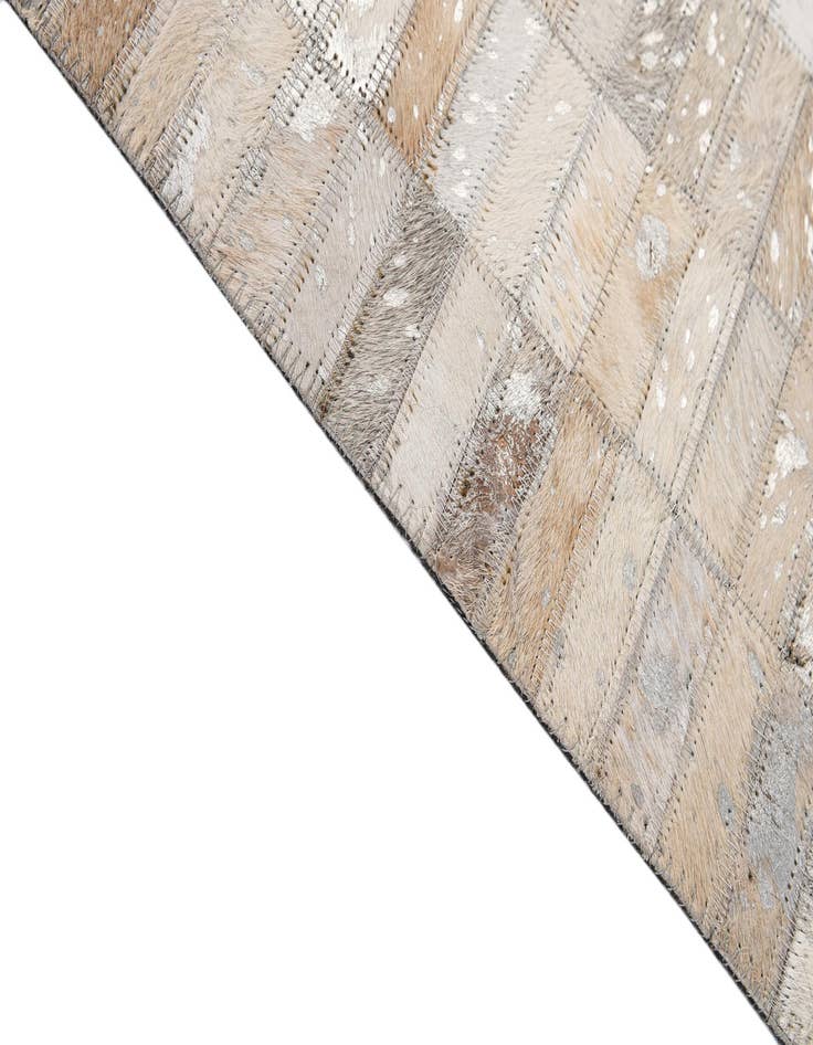 Detail image of  4' 11 x 7' 11 Cowhide - Patchwork Rug