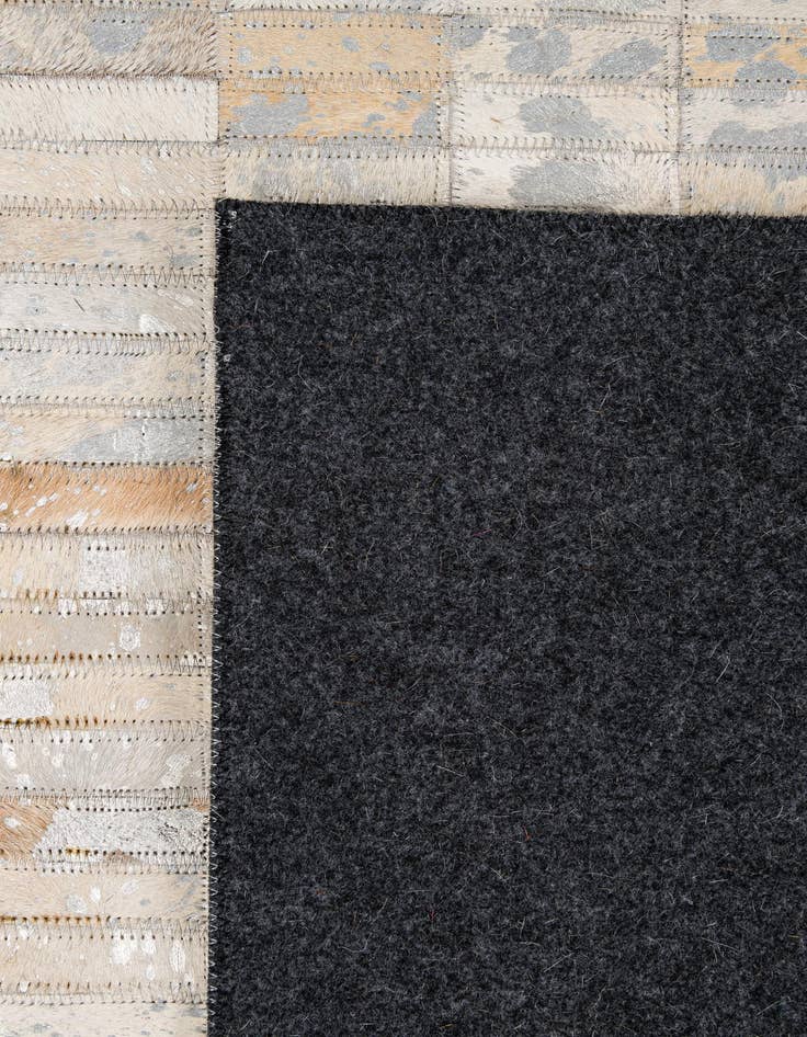 Detail image of  4' 11 x 7' 11 Cowhide - Patchwork Rug