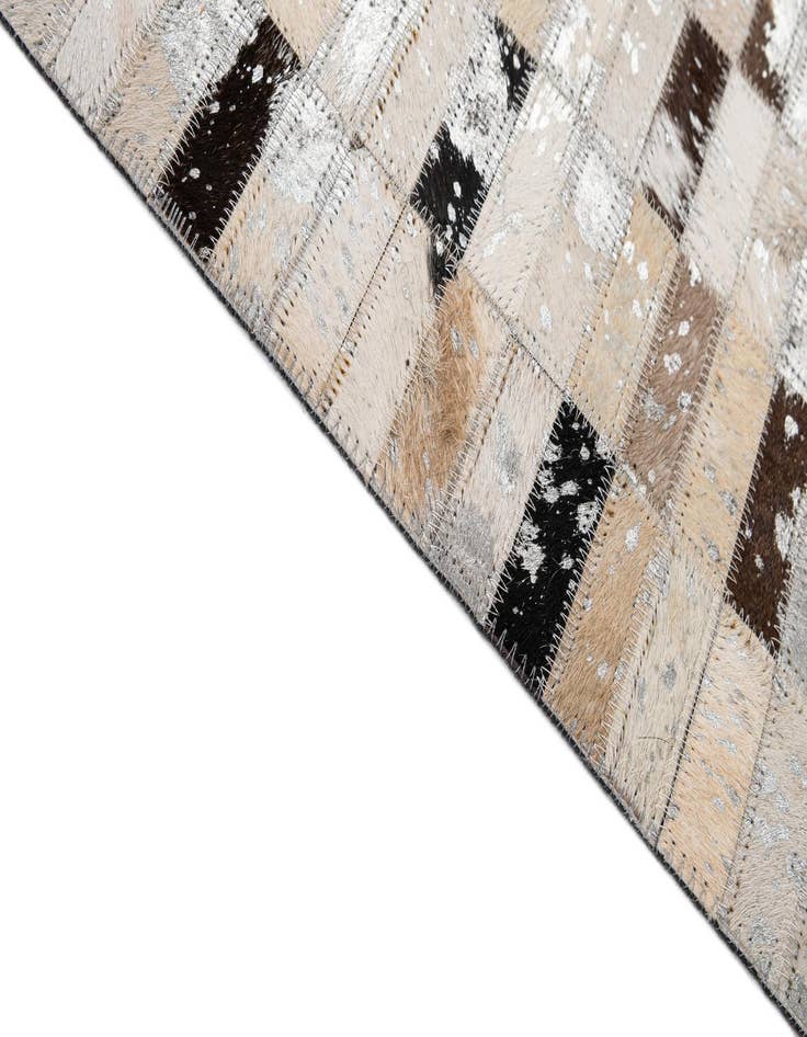 Detail image of  5' x 7' 11 Cowhide - Patchwork Rug