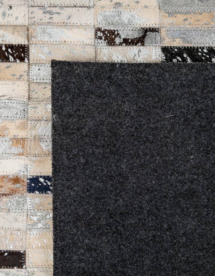 Detail image of  5' x 7' 11 Cowhide - Patchwork Rug