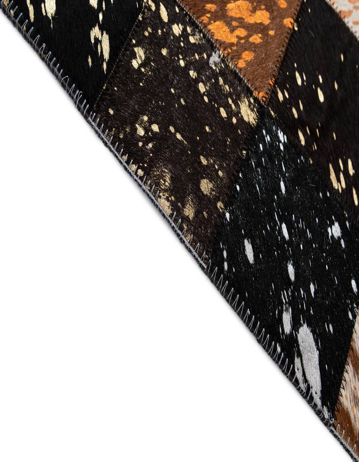Detail image of  4' 11 x 7' 10 Cowhide - Patchwork Rug