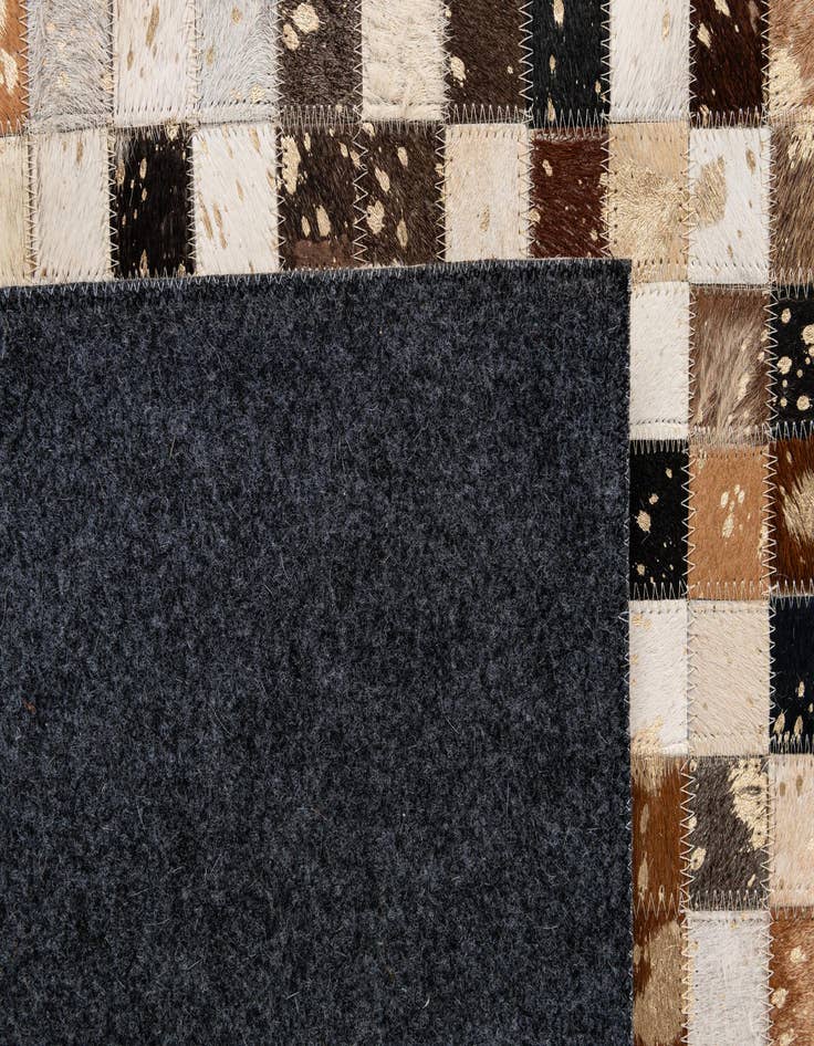 Detail image of  5' 1 x 8' Cowhide - Patchwork Rug