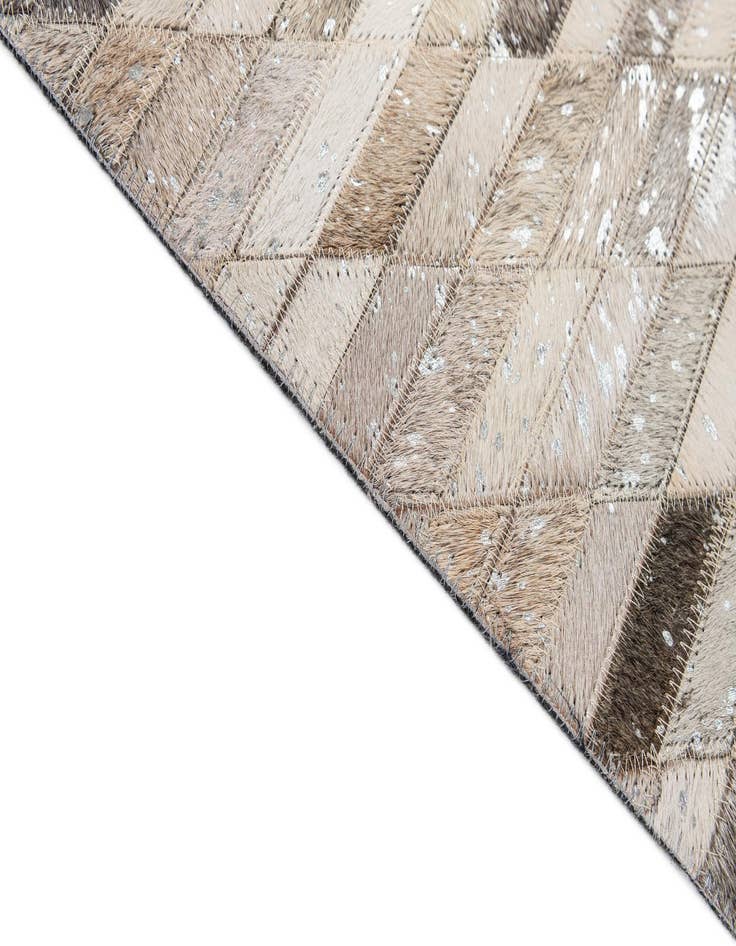 Detail image of  5' 1 x 7' 11 Cowhide - Patchwork Rug