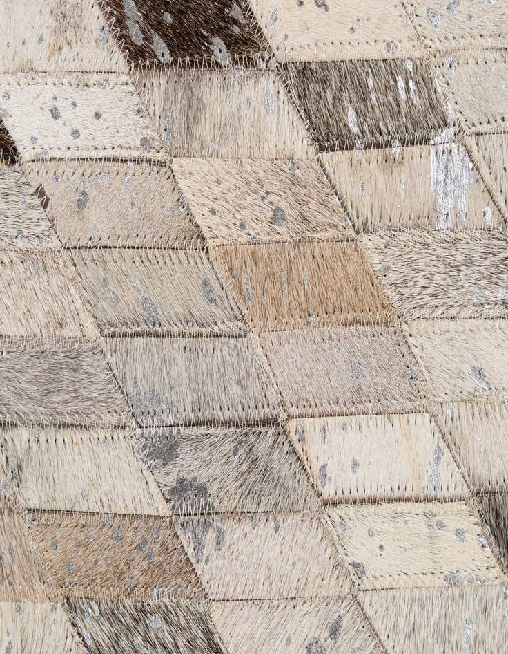 Detail image of  5' 1 x 7' 11 Cowhide - Patchwork Rug