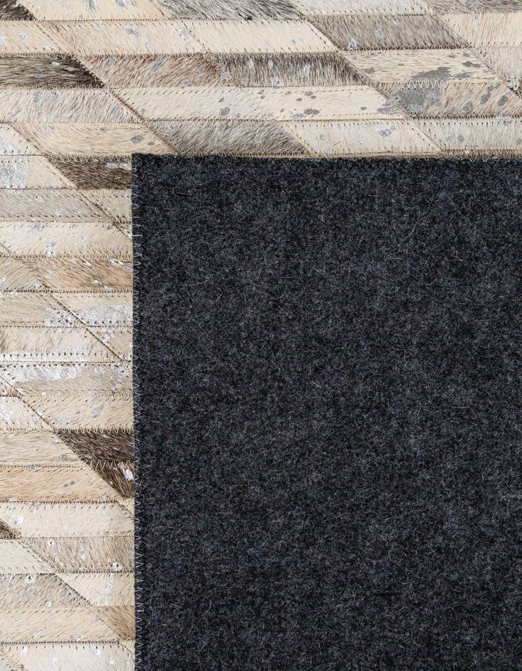 Detail image of  5' 1 x 7' 11 Cowhide - Patchwork Rug