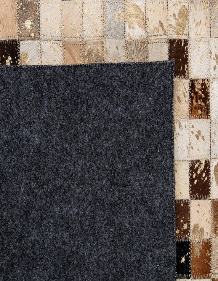 Detail image of  5' 2 x 8' 2 Cowhide - Patchwork Rug
