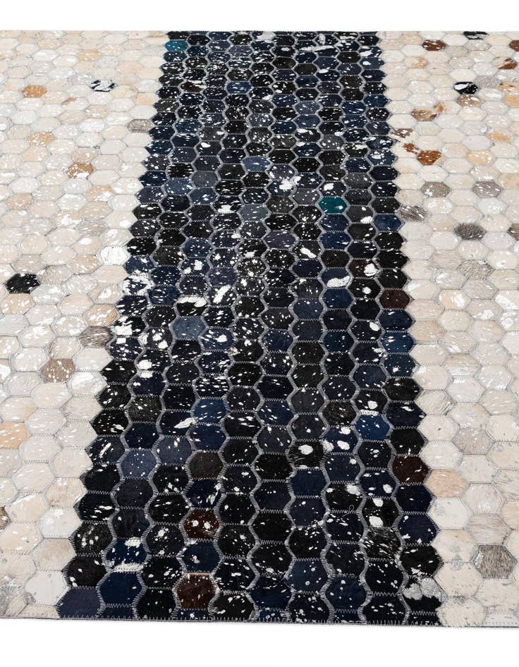 Detail image of  5' 1 x 7' 11 Cowhide - Patchwork Rug