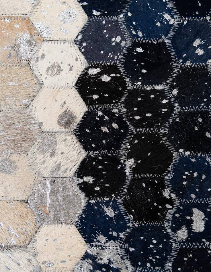 Detail image of  5' 1 x 7' 11 Cowhide - Patchwork Rug