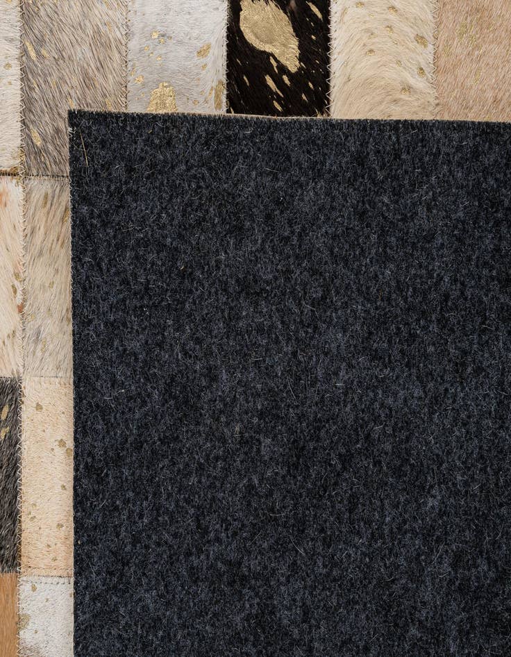 Detail image of  5' 1 x 8' Cowhide - Patchwork Rug