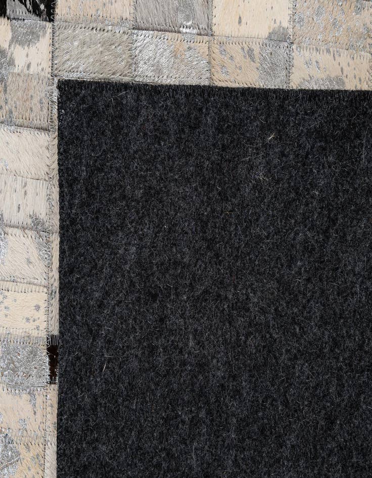 Detail image of  5' 1 x 8' 1 Cowhide - Patchwork Rug