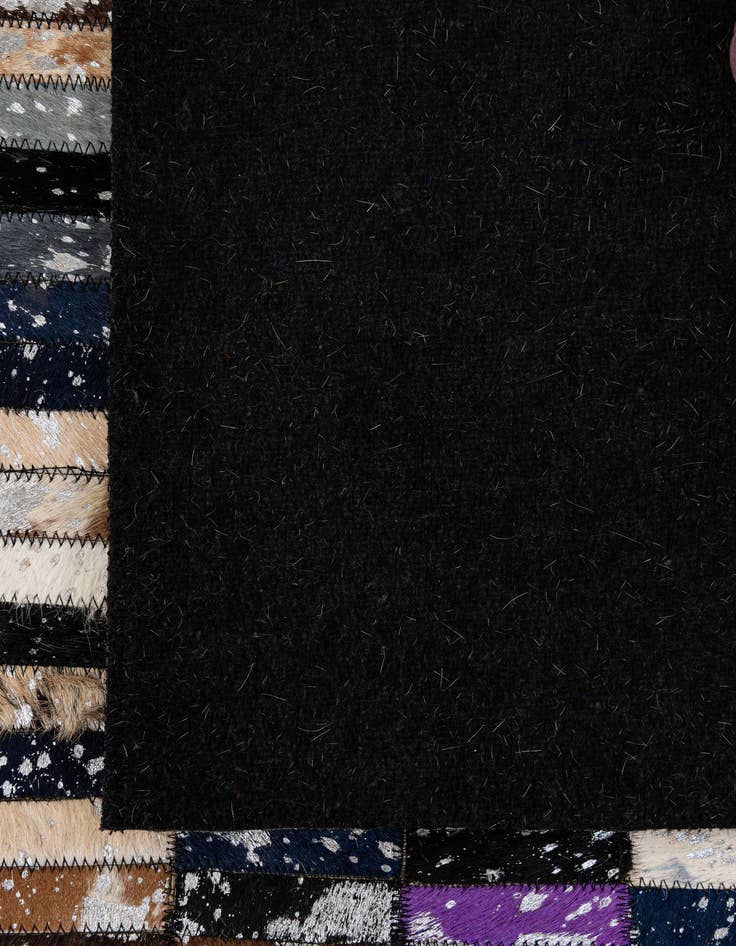Detail image of  5' x 7' 11 Cowhide - Patchwork Rug