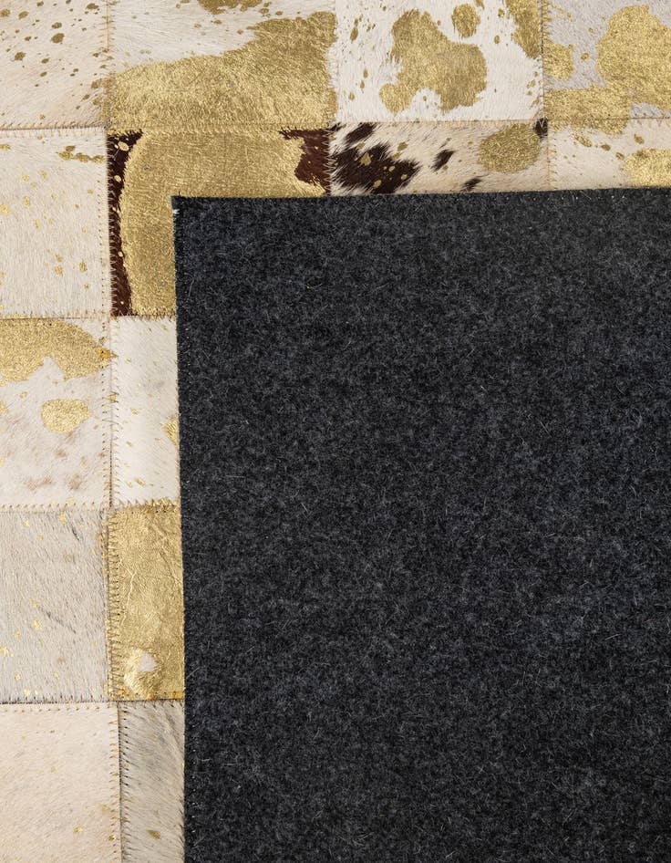 Detail image of  4' 11 x 7' 11 Cowhide - Patchwork Rug
