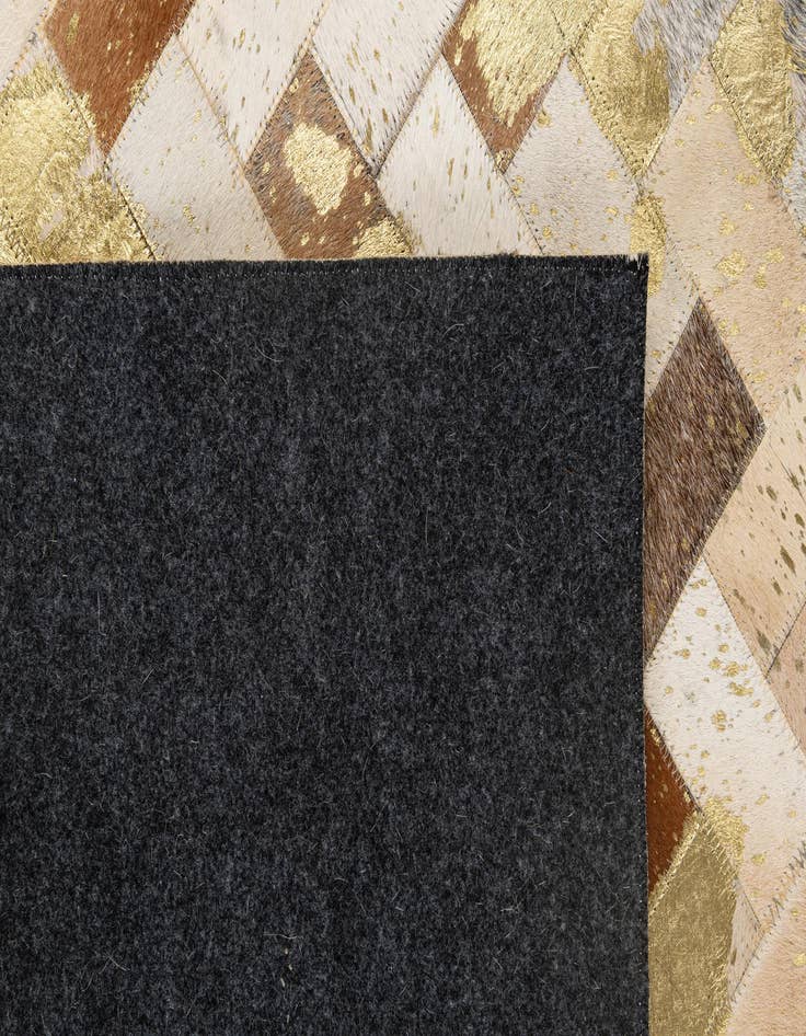 Detail image of  5' 1 x 7' 11 Cowhide - Patchwork Rug