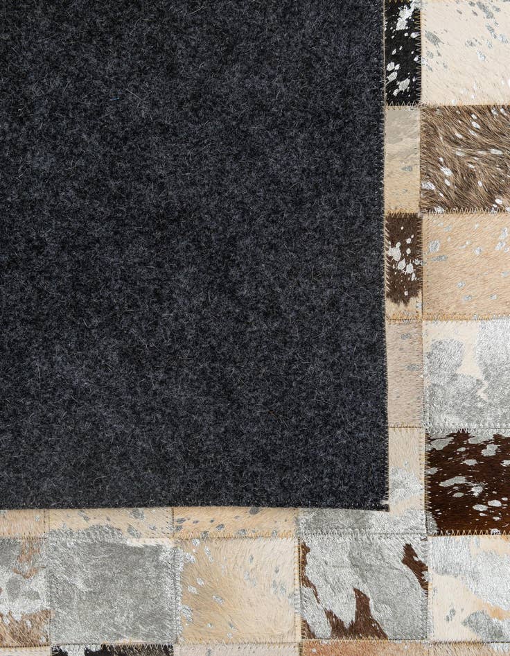 Detail image of  5' 1 x 8' 1 Cowhide - Patchwork Rug