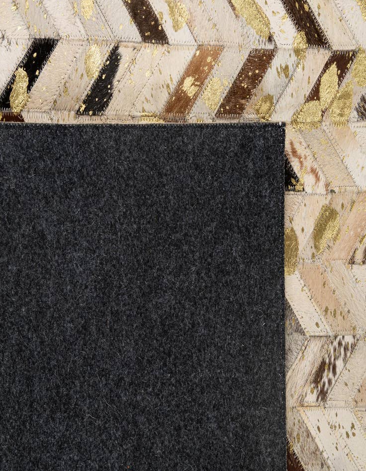 Detail image of  5' 2 x 7' 11 Cowhide - Patchwork Rug