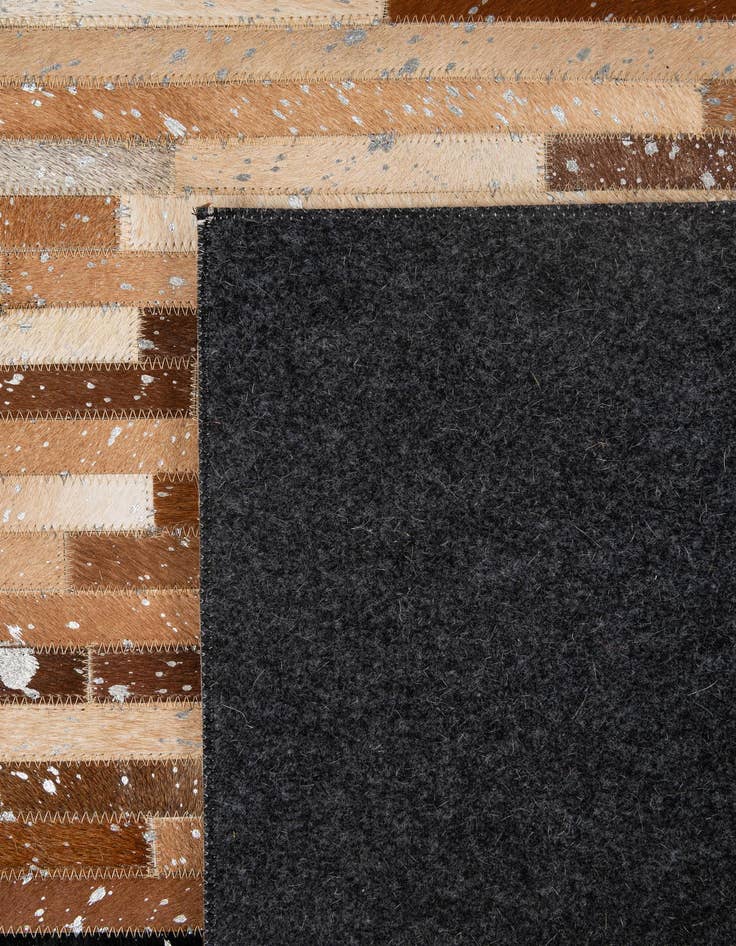 Detail image of  5' 1 x 8' 1 Cowhide - Patchwork Rug