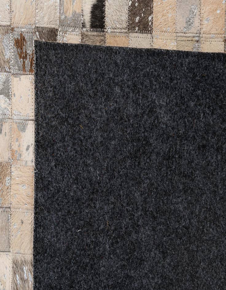 Detail image of  4' 11 x 7' 11 Cowhide - Patchwork Rug