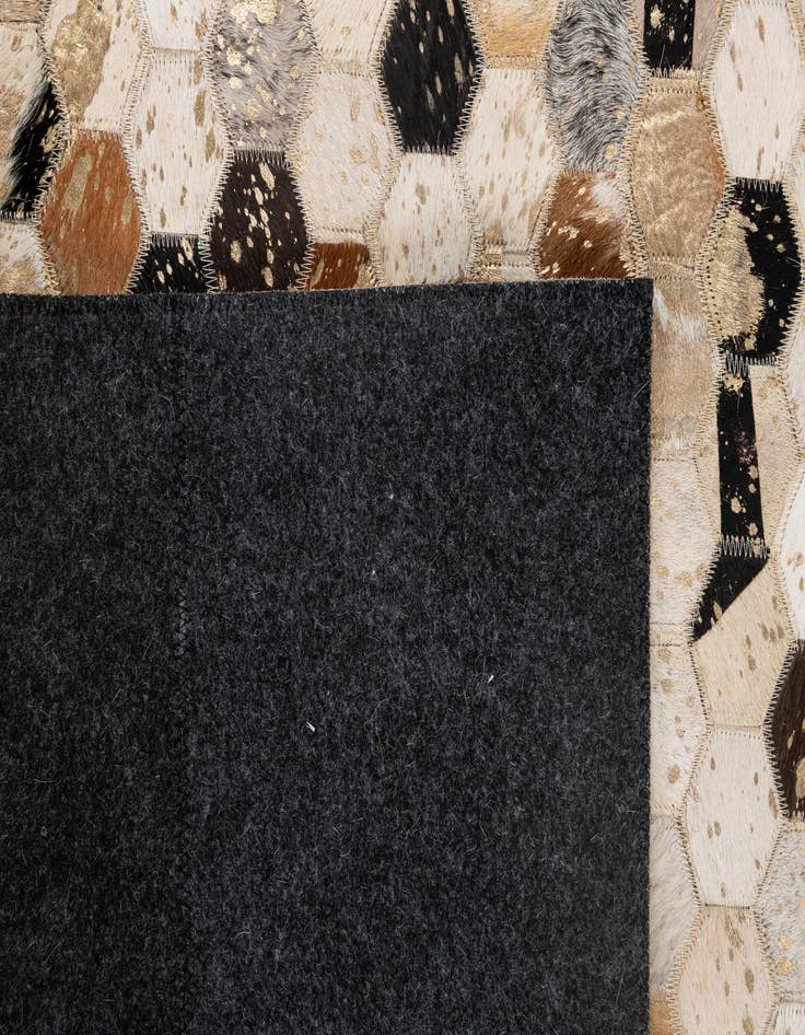 Detail image of  5' 1 x 8' Cowhide - Patchwork Rug