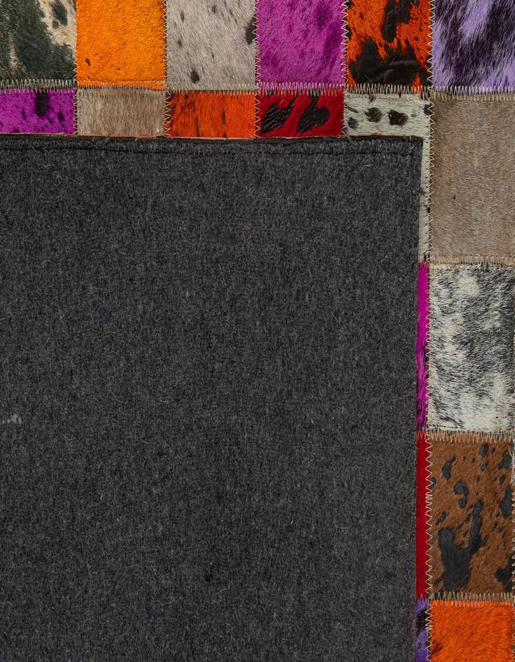 Detail image of  5' 1 x 7' 11 Cowhide - Patchwork Rug
