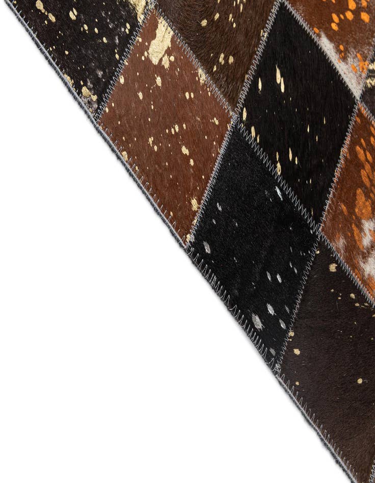 Detail image of  4' 11 x 7' 10 Cowhide - Patchwork Rug